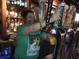 Postmasters Grill employee serves up draft beer